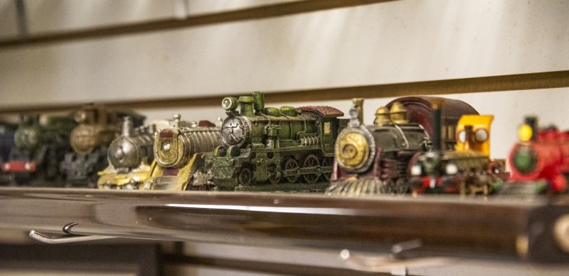 Cast-iron trains are among the items collected by John Chirtea.